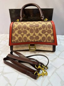 کیف دستی زنانه کوچ (COACH) مدل مجلسی با بند کوتاه و بلند چرمی