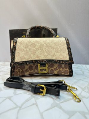 کیف دستی زنانه کوچ (COACH) مدل مجلسی با بند کوتاه و بلند چرمی