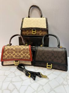 کیف دستی زنانه کوچ (COACH) مدل مجلسی با بند کوتاه و بلند چرمی