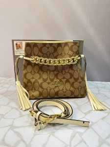 کیف دوشی زنانه کوچ عسلی (COACH) مدل زنجیری – کیف مجلسی لوکس و سبک با طراحی خاص