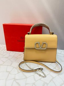 کیف دستی مجلسی ولنتینو مدل لوکس با دسته نگین‌دار و بند زنجیری