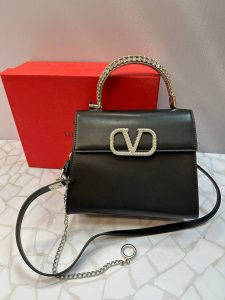 کیف دستی مجلسی ولنتینو مدل لوکس با دسته نگین‌دار و بند زنجیری