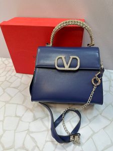 کیف دستی مجلسی ولنتینو مدل لوکس با دسته نگین‌دار و بند زنجیری