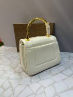 کیف بولگاری مجلسی زنانه با طراحی خاص دسته طلایی و قفل کله‌مار