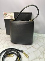 کیف پرادا زنانه مجلسی دستی و دوشی شیک و لوکس با طراحی ظریف و بسته‌بندی اصلی